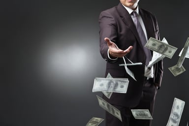 Man throwing money