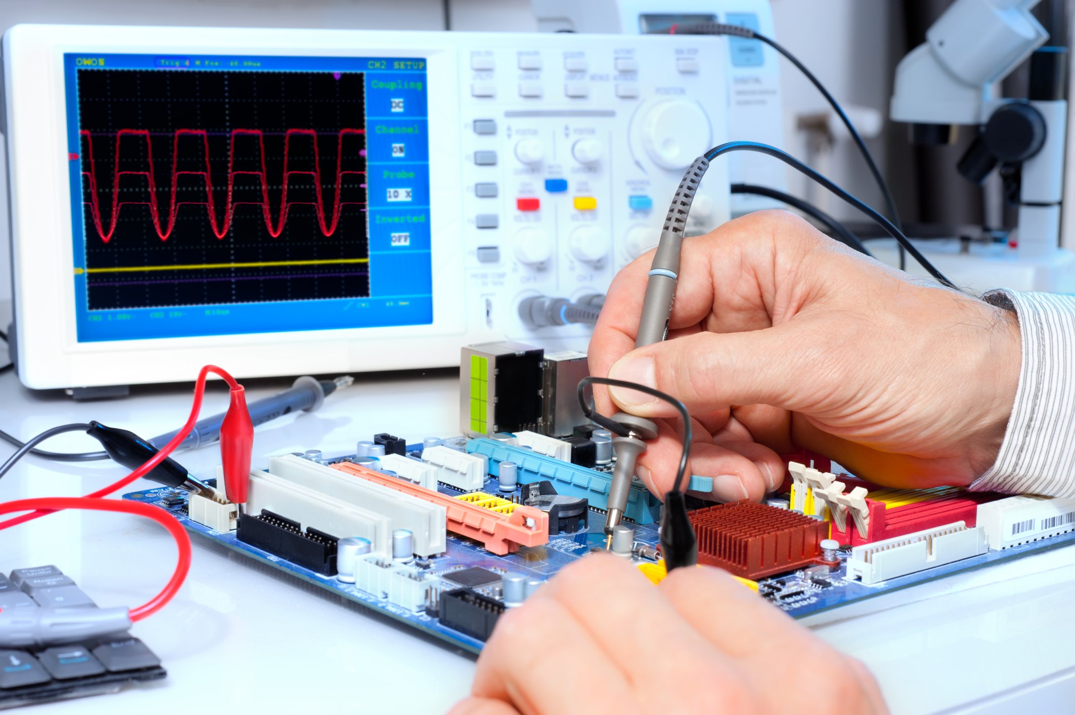 Using an oscillator to test electronic equipment.