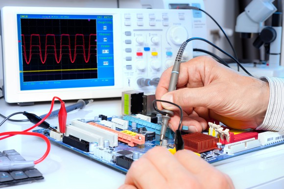 Using an oscillator to test electronic equipment.