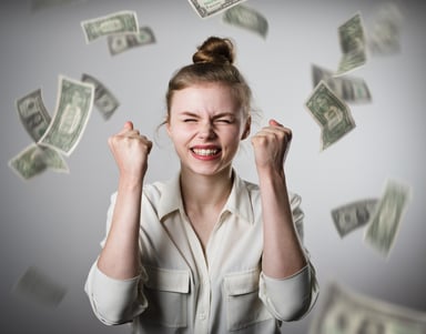 money raining on woman celebrating
