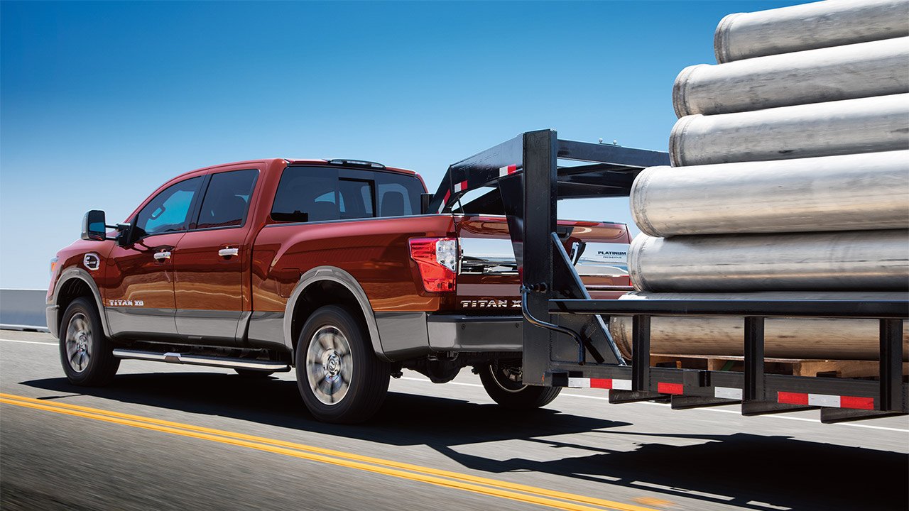 2017 Nissan Titan towing a loaded trailer