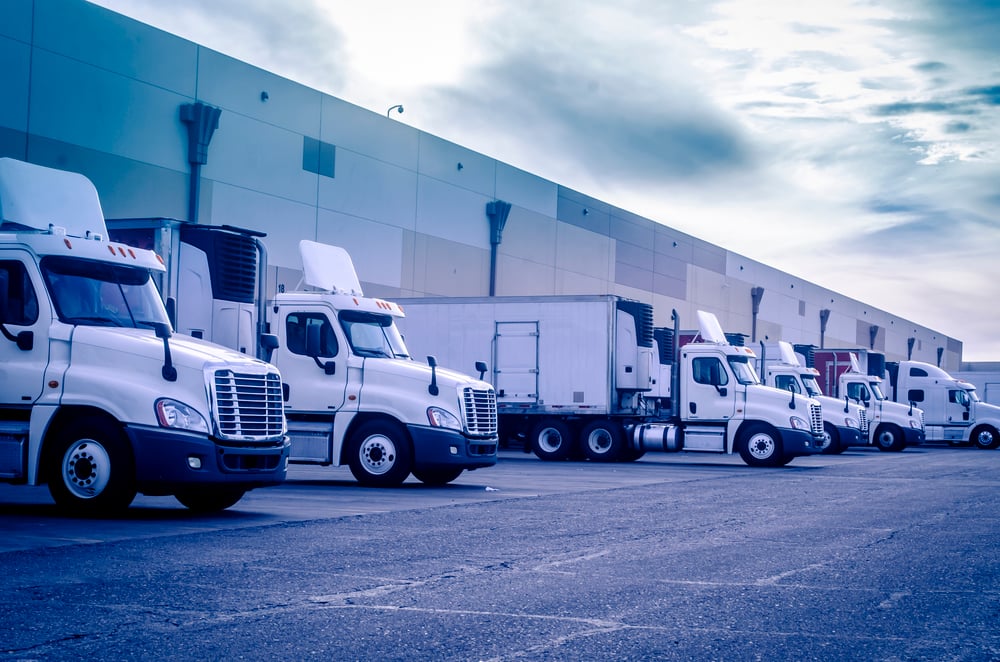 Trucks loading at a warehouse