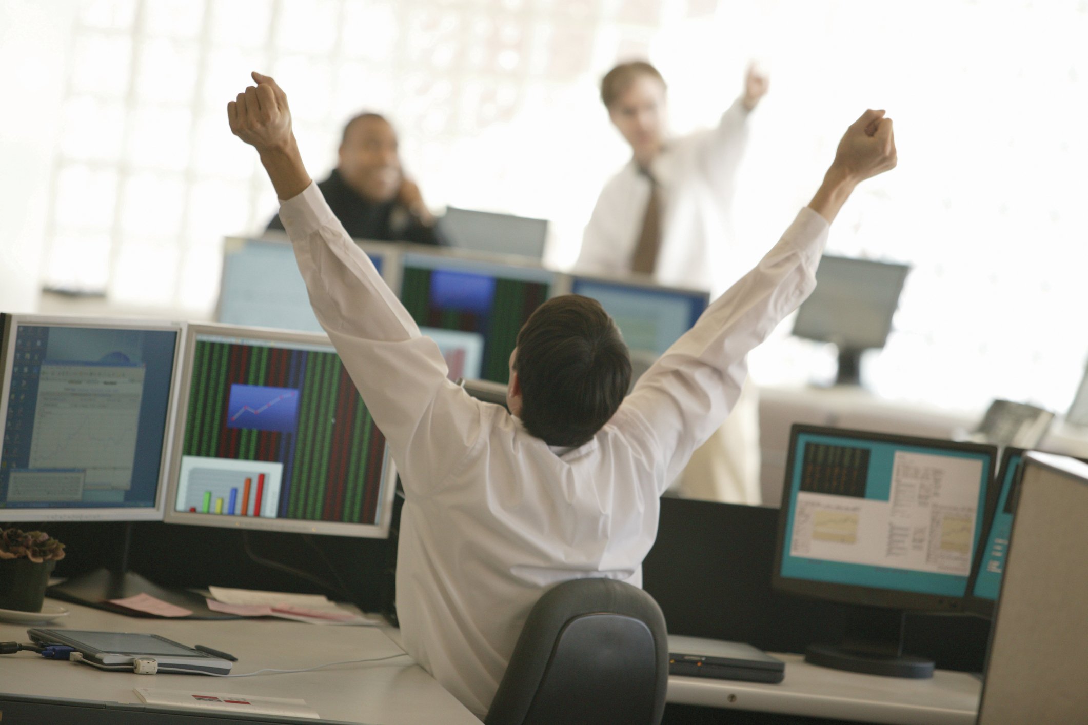 Excited stock owner watching share price rise