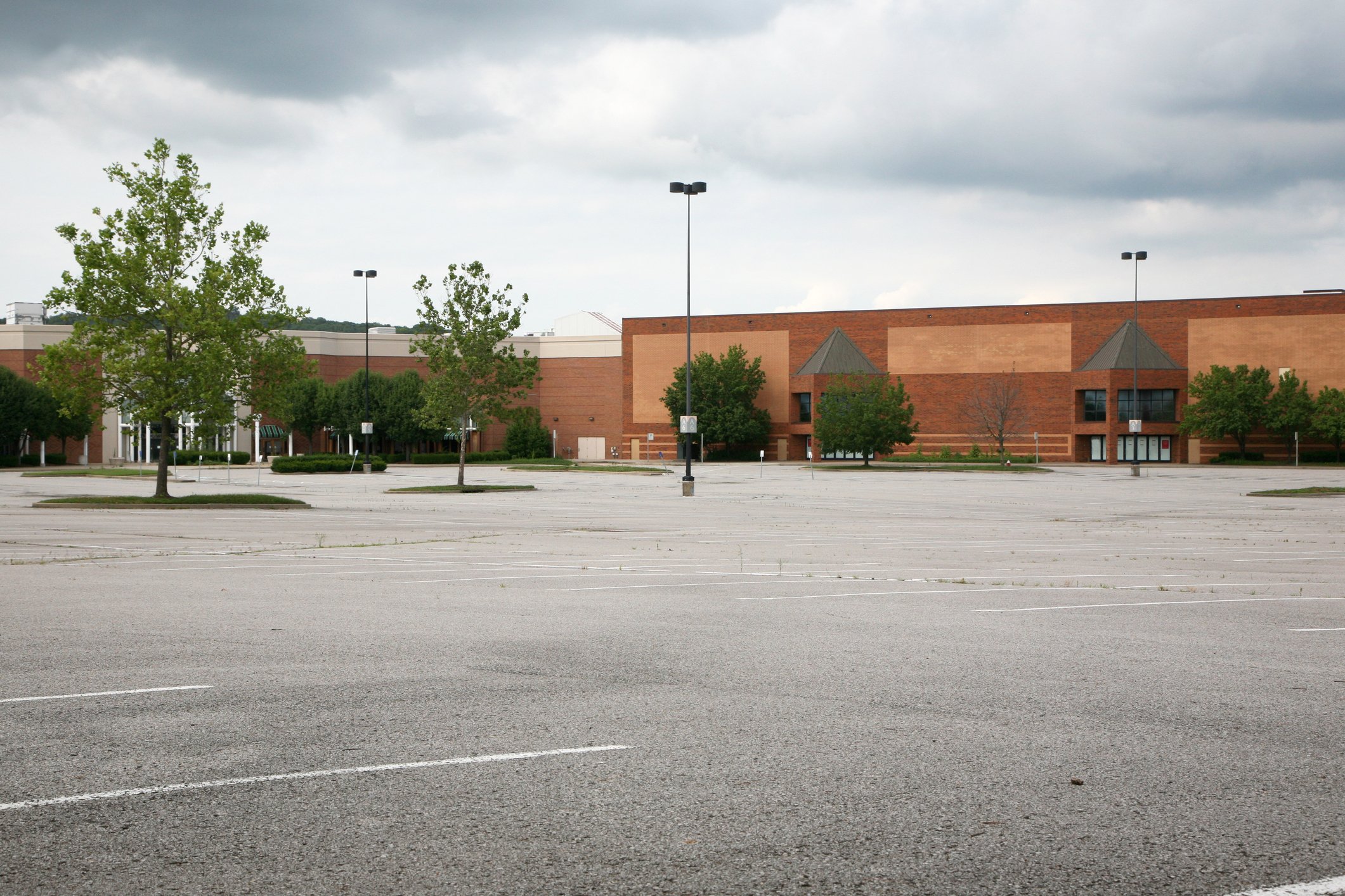 Empty mall parking lot fronting closed department store