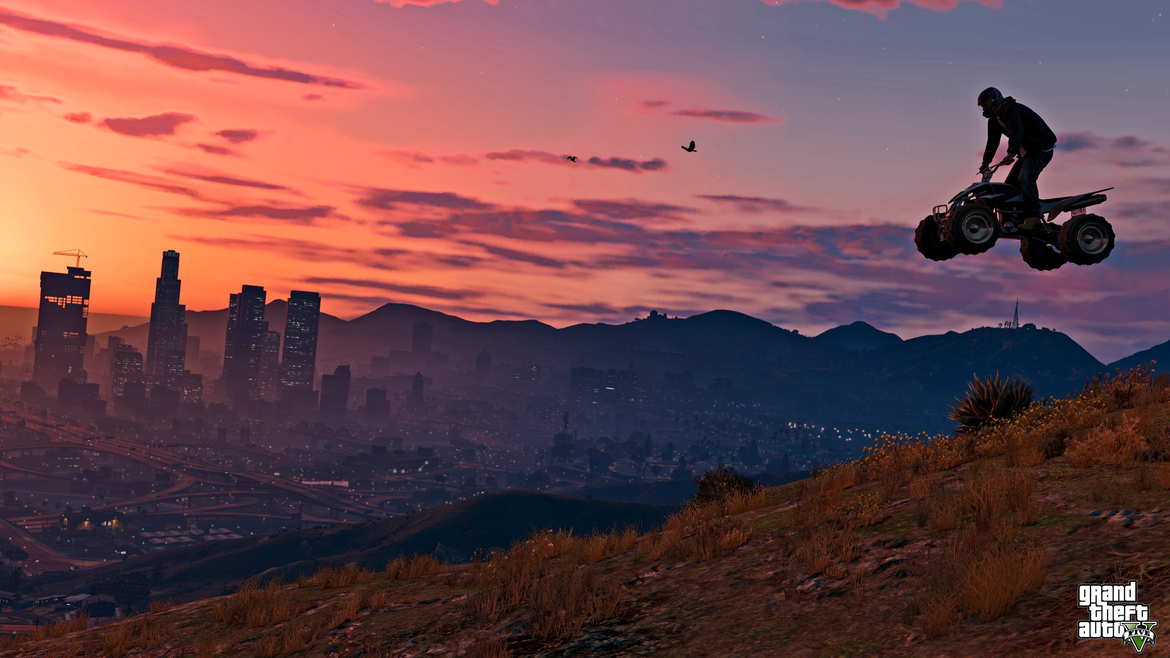 Screenshot from "Grand Theft Auto V" featuring a character flying through the air on a four-wheeler at sunset.