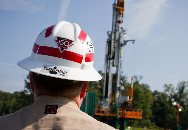 A Consol Energy employee at a well.