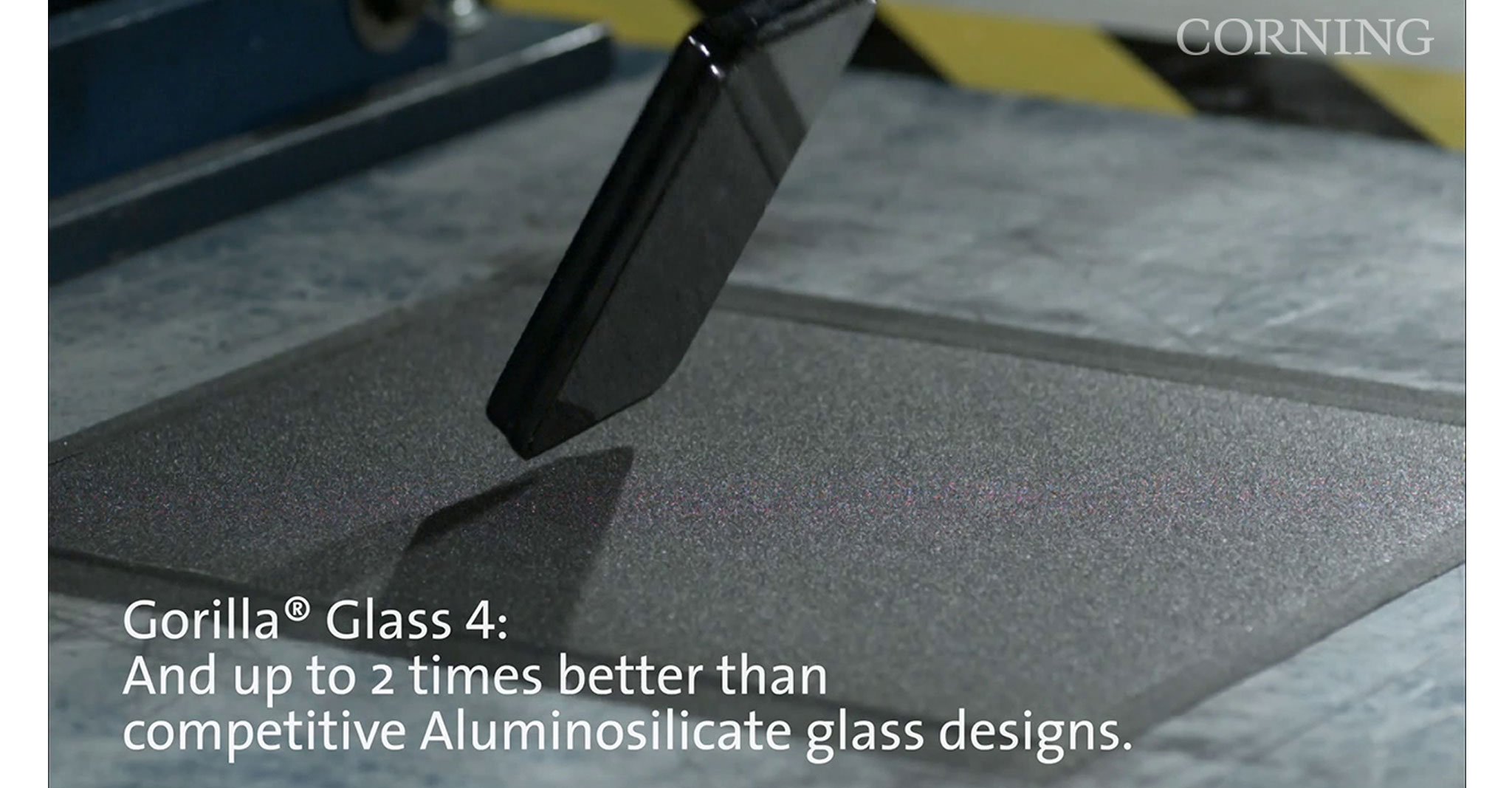 Cellphone built with Corning's Gorilla Glass being dropped to test durability. Gorilla Glass 4 beats the competition.