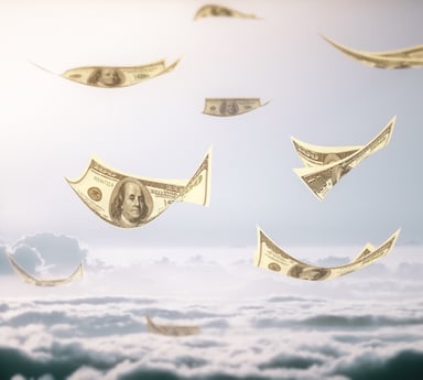 Hundred dollar bills flying above clouds