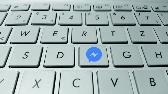 A keyboard with the Facebook Messenger icon replacing the F key.