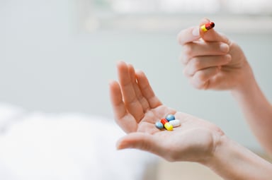 pills in hand getty