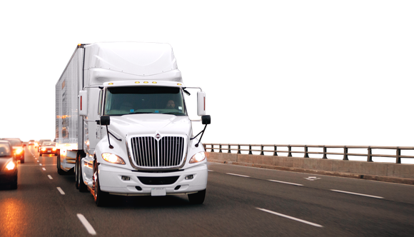 White semi truck on a road.