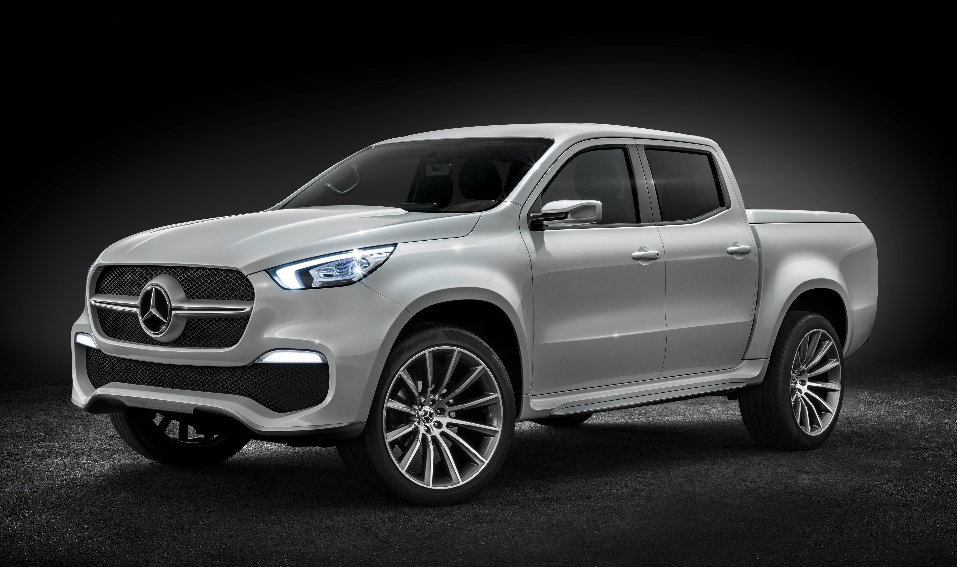 A silver Mercedes-Benz X-Class pickup truck.