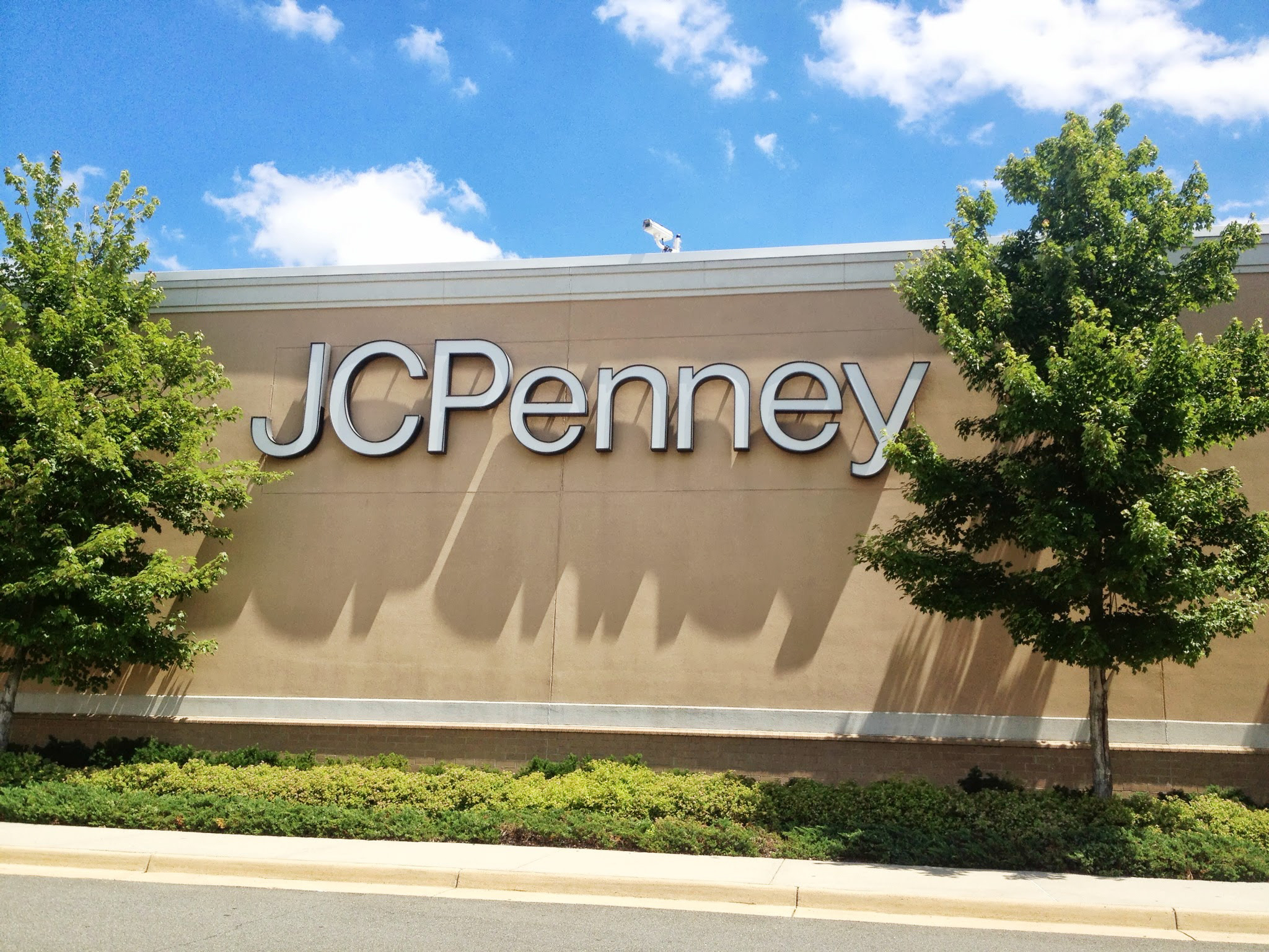 The exterior of a J.C. Penney store in the sunlight