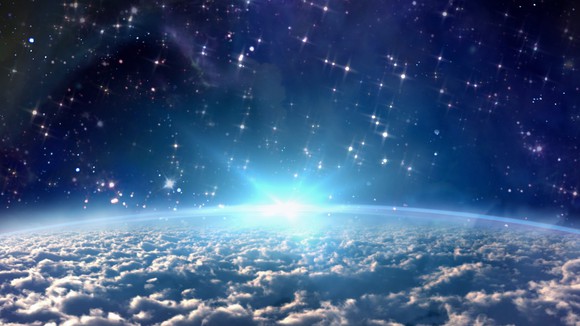 Bright star rising above horizon.