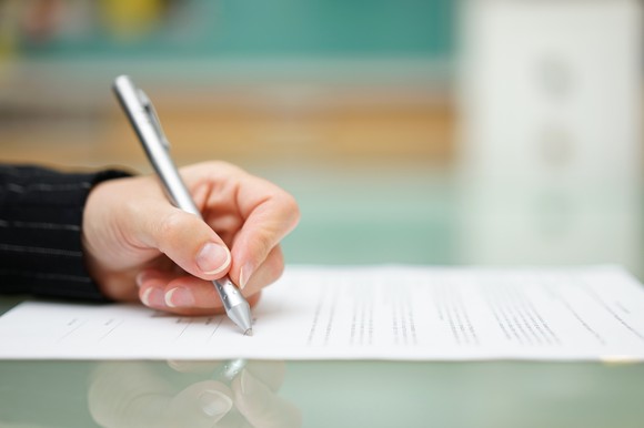 A person signing a loan document