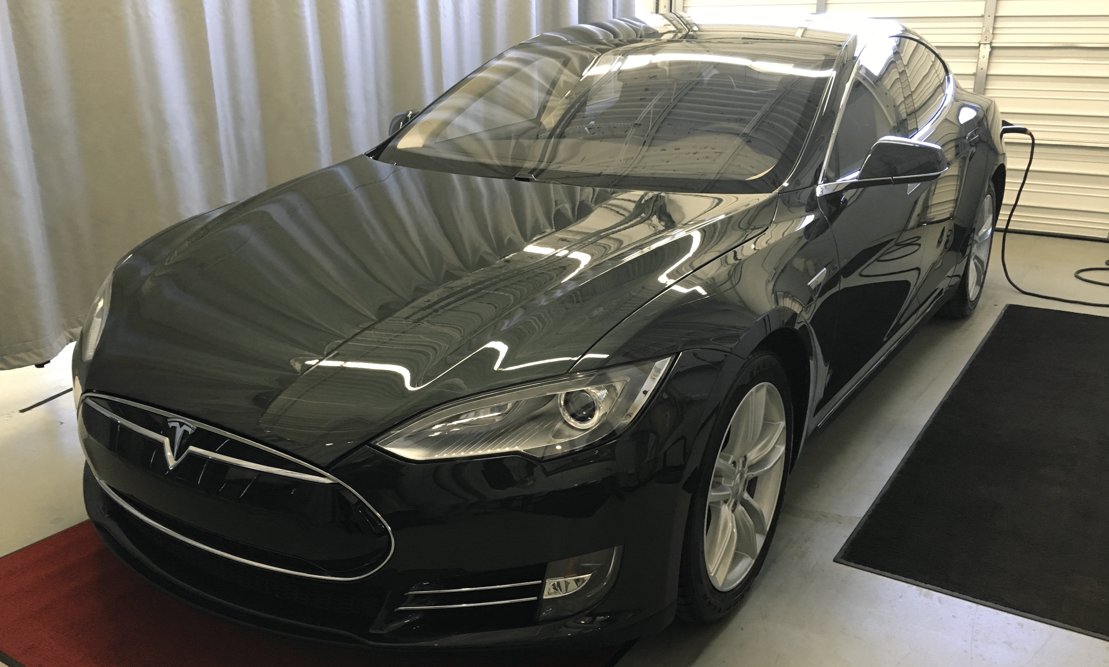 Model S being delivered at a Tesla service center