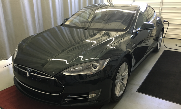 Model S being delivered at a Tesla service center
