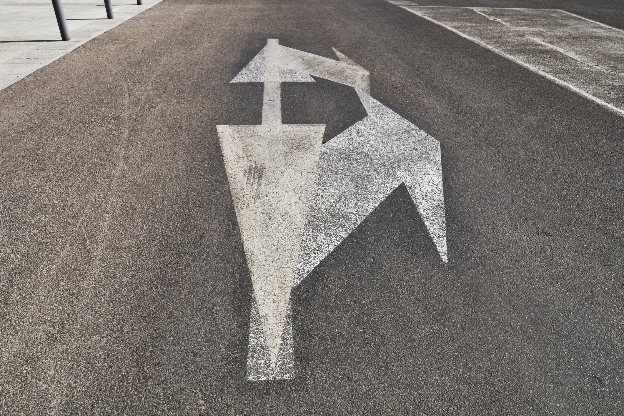 A confusing set of street marking arrows.