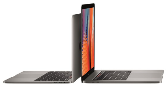 This image shows Apple's 13-inch and 15-inch MacBook Pro computers aligned back-to-back with each other. 