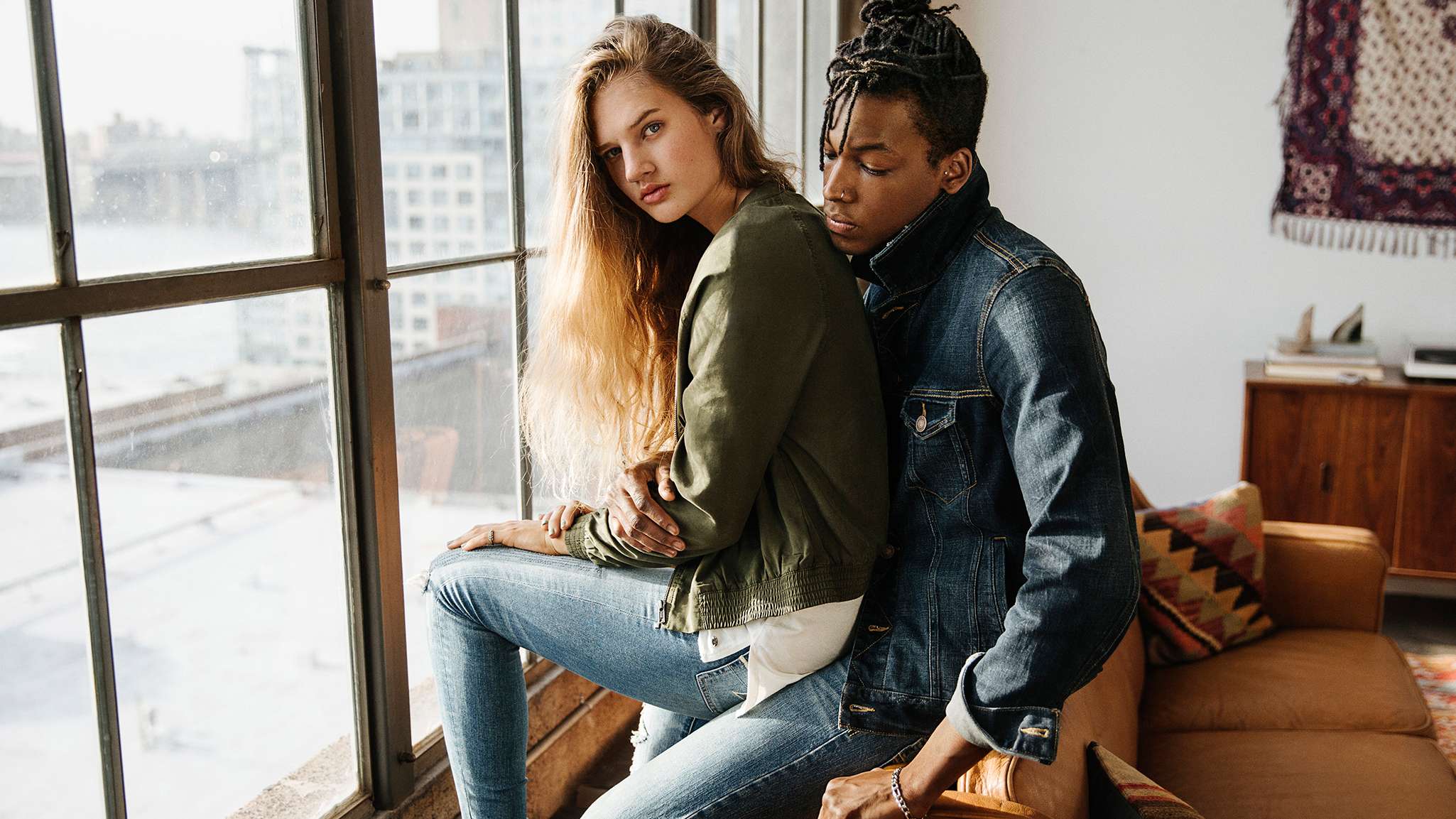 An AEO ad featuring a female and male model.