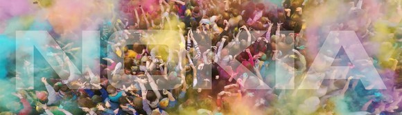 A multi-colored collage of people with the company name printed on top.