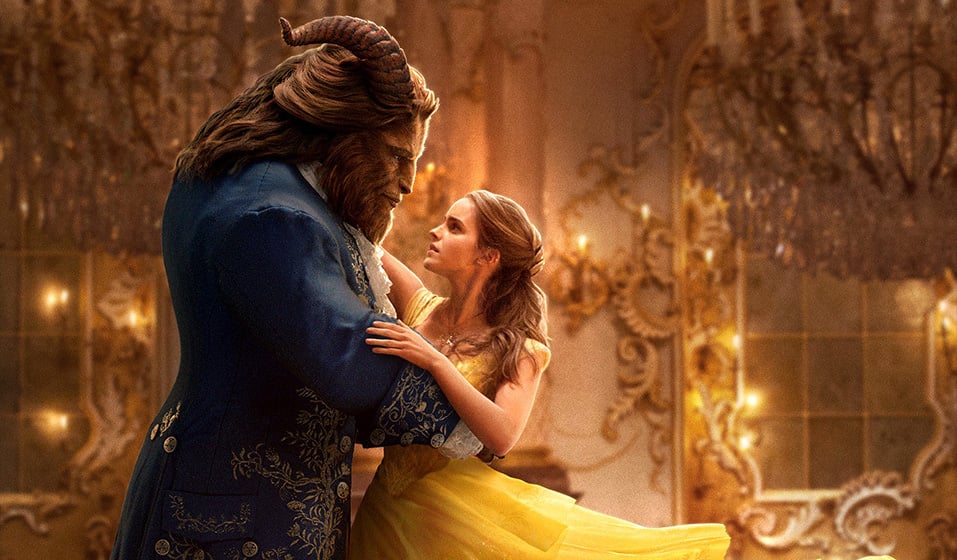 A scene from the upcoming live action remake of Beauty and the Beast with Belle and the Beast dancing in a ballroom.