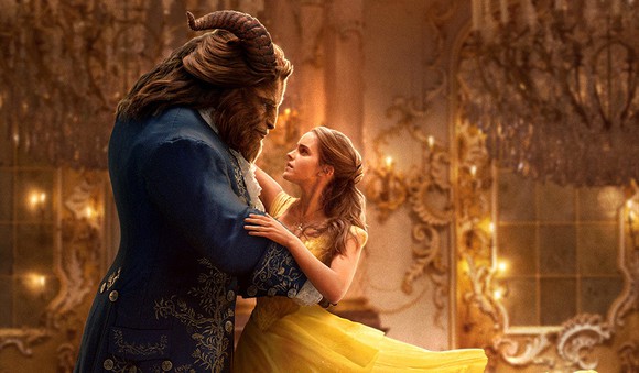 A scene from the upcoming live action remake of Beauty and the Beast with Belle and the Beast dancing in a ballroom.