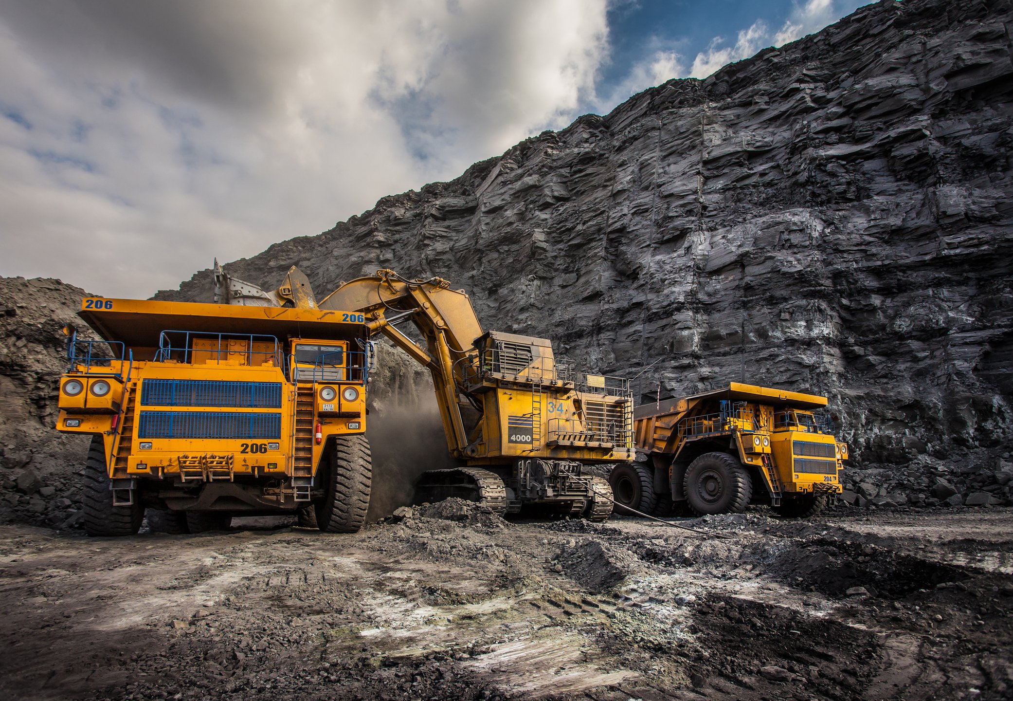 Heavy equipment at a mining site.