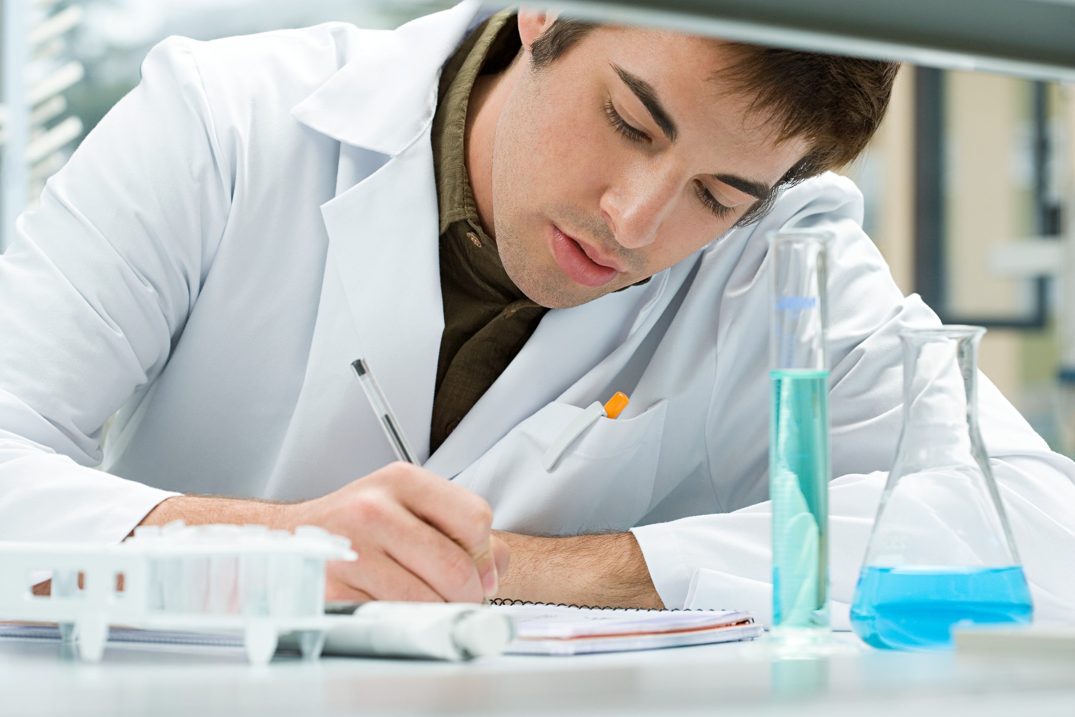 Lab researcher testing fluids for influenza