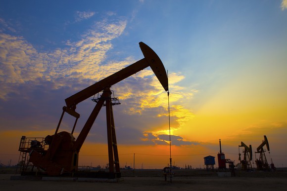 An oil pump at sunset