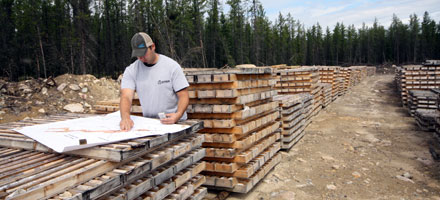 A Denison employee working at mine project.