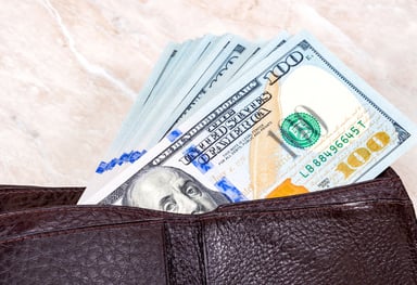 wallet full of hundred dollar bills cash money