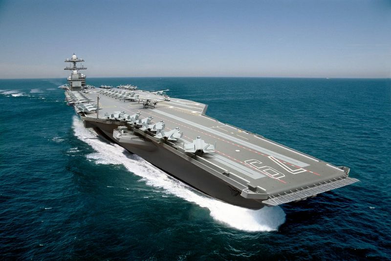 Ford-class supercarrier on open water.