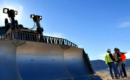 Coeur miners with a mine vehicle.