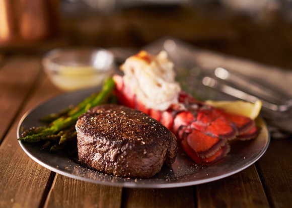 A steak and lobster meal.