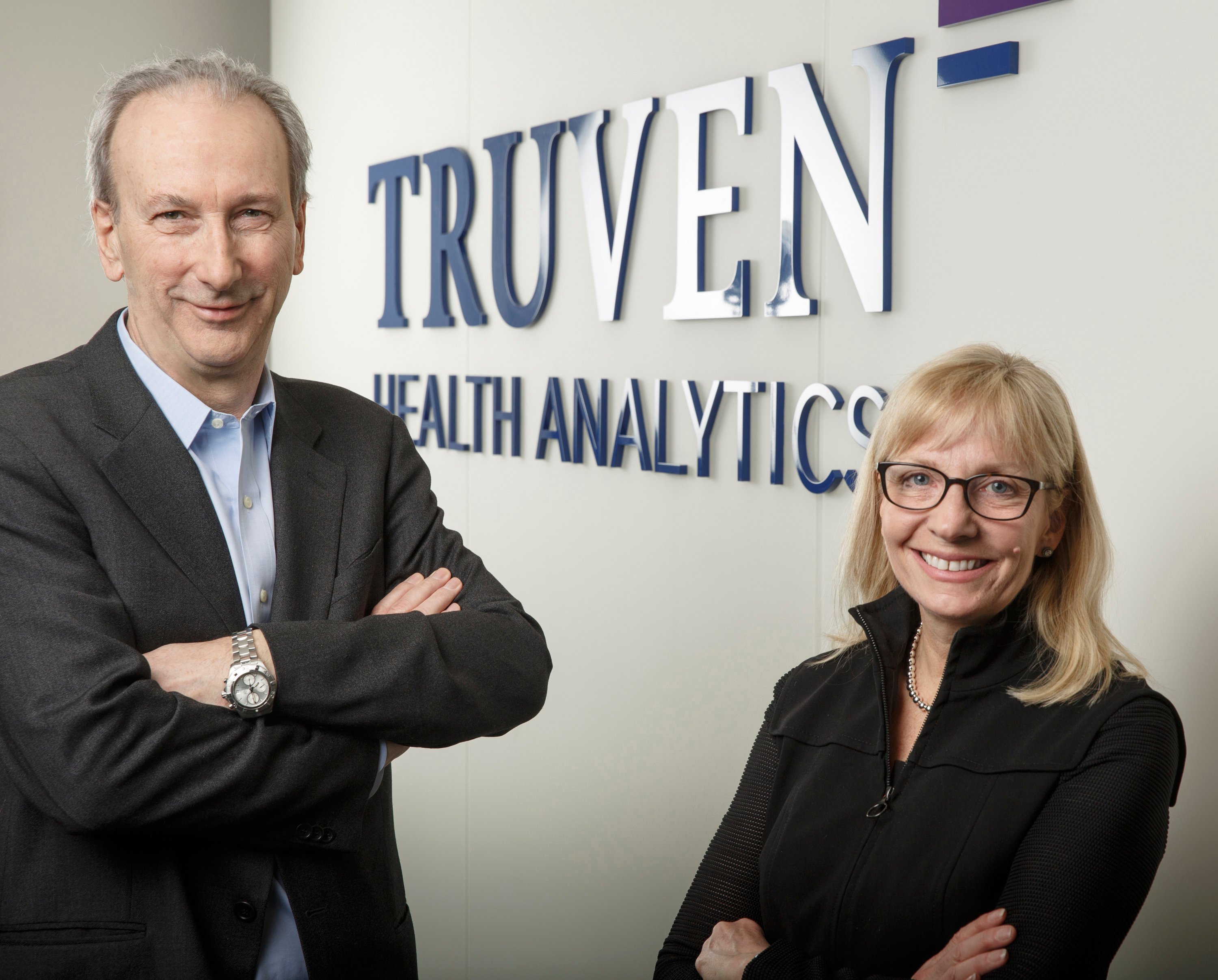 Truven Health Analytics CEO Mike Boswood, left, and IBM Watson Health General Manager Deborah DiSanzo, right.