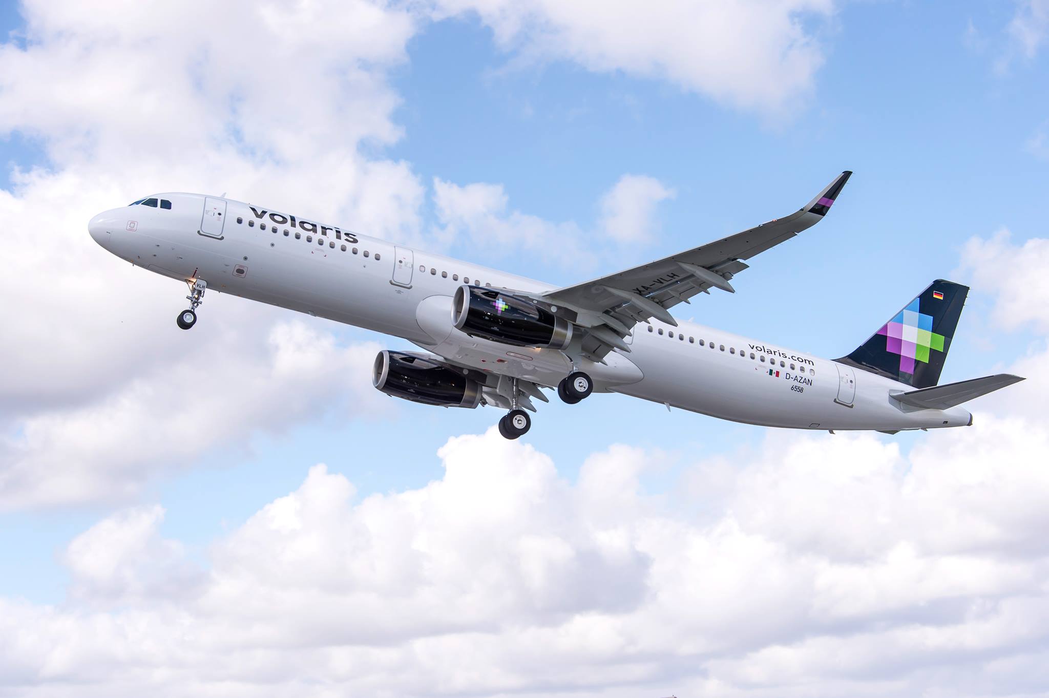 A Volaris airplane in flight.