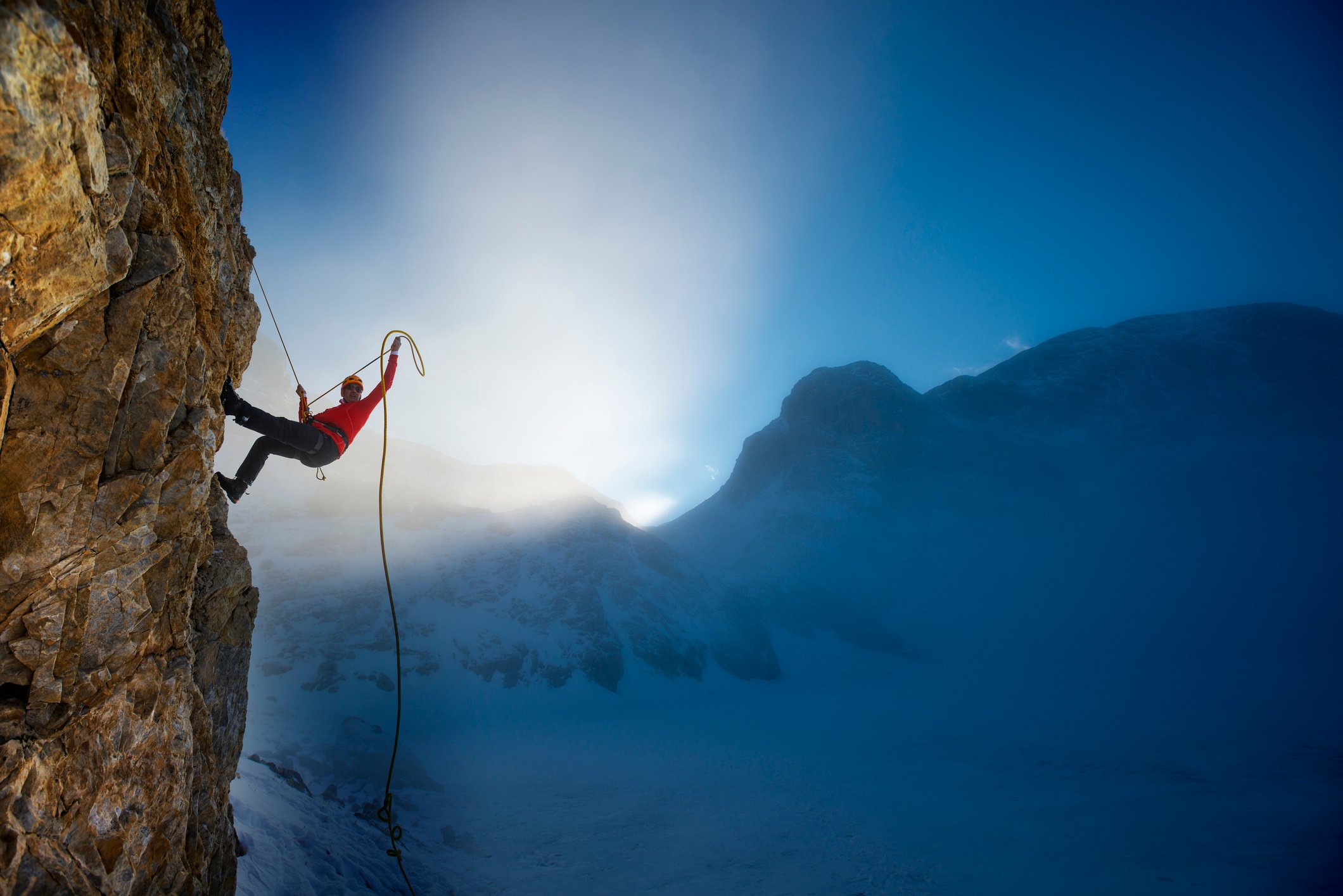 Man climbing a mountain