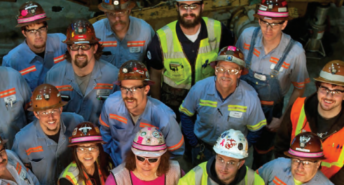 Barrick Gold employees looking up.