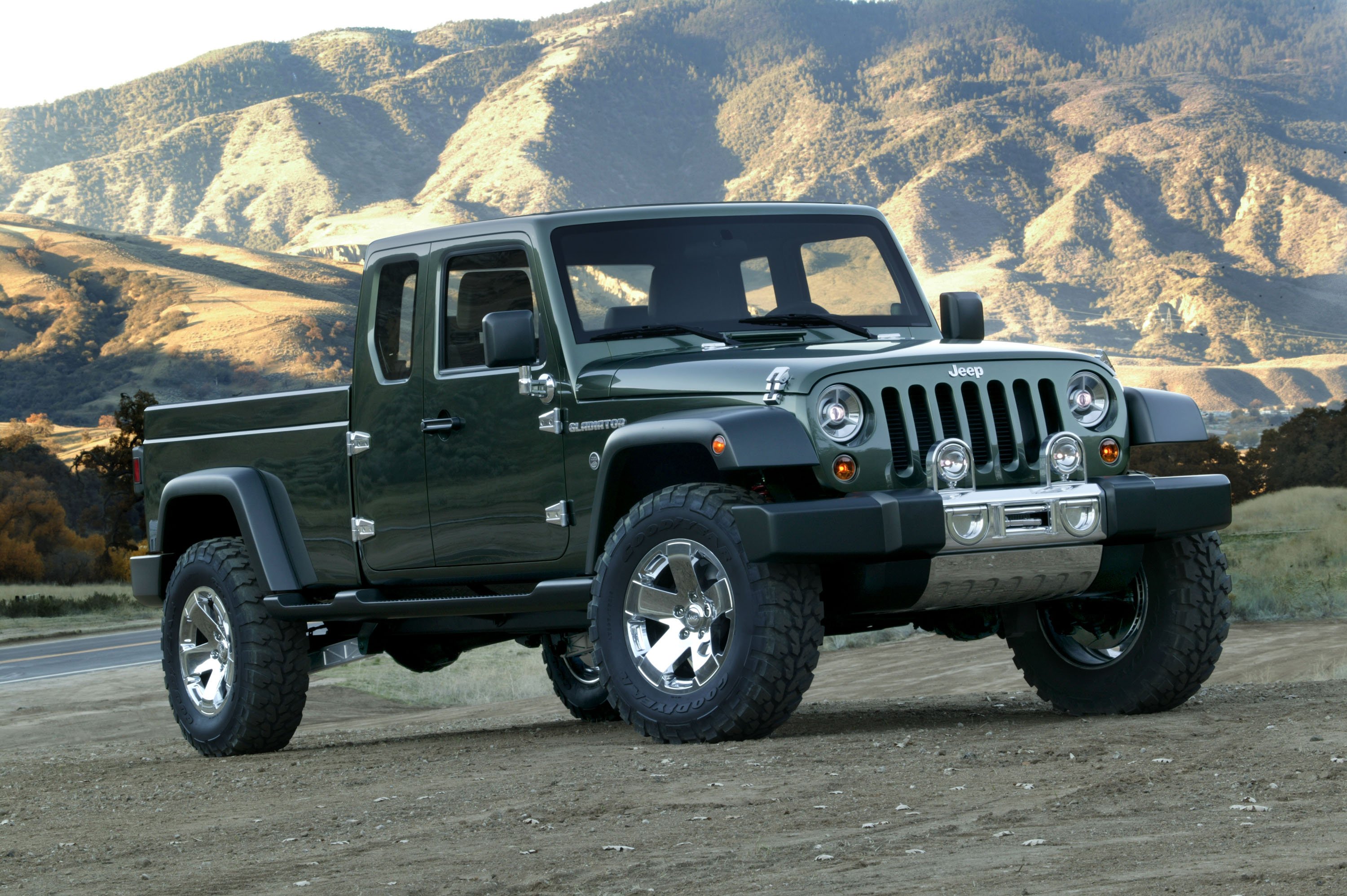 The 2005 Jeep Gladiator Concept, a green pickup truck based on the Wrangler.