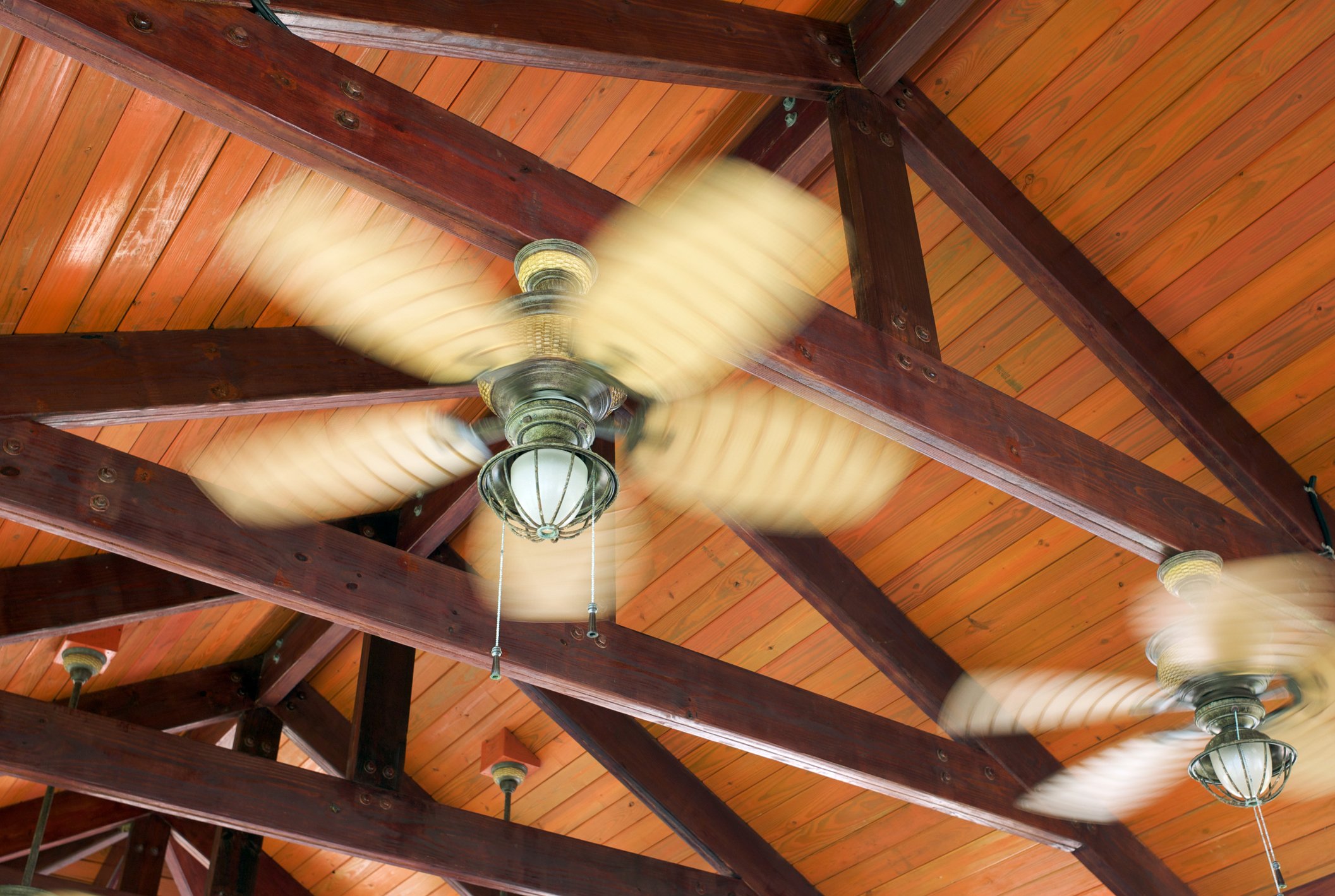 Ceiling fans spinning.