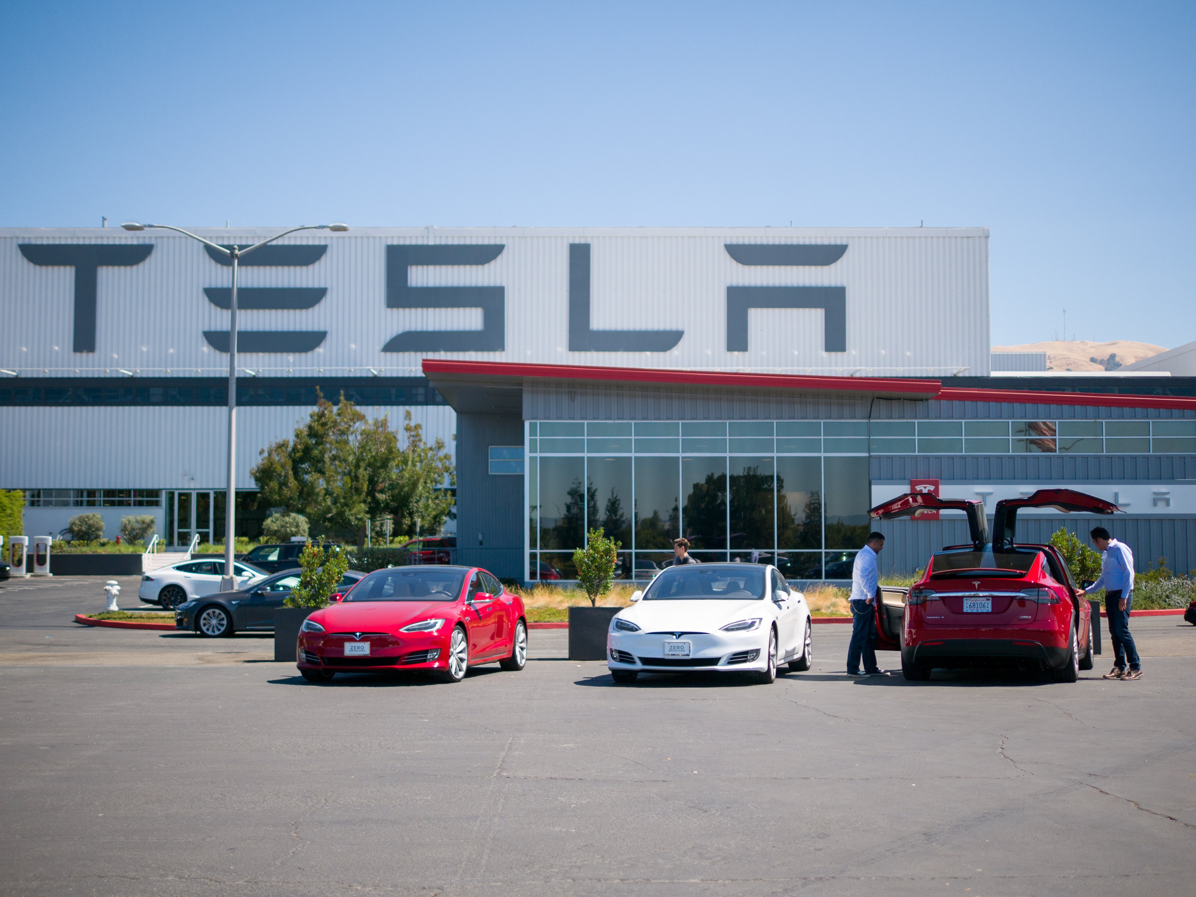 Tesla vehicles outside of Tesla factory.