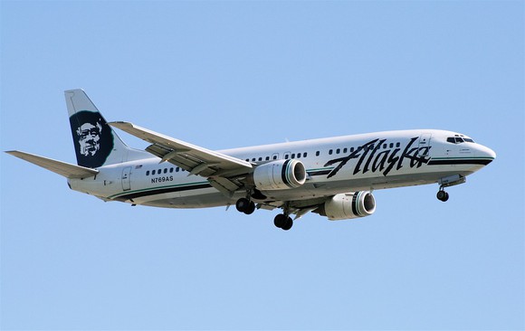An Alaska Air plane in flight.