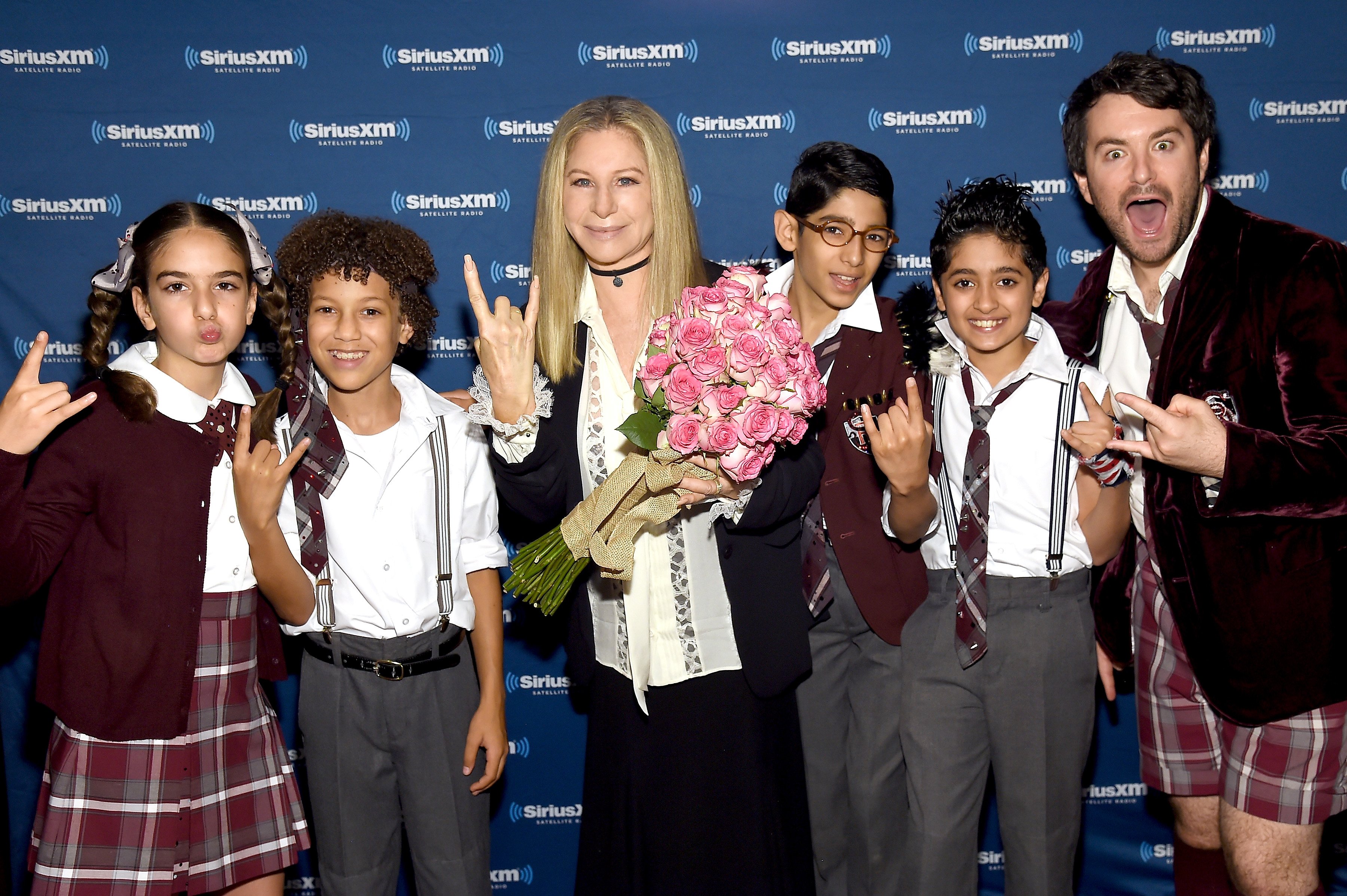 Barbara Streisand with the cast of Broadway's School of Rock musical.