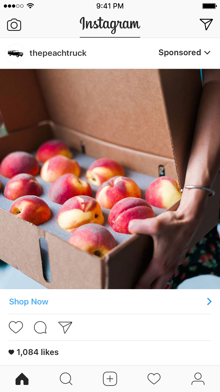 A promoted post on Instagram on a box of peaches.