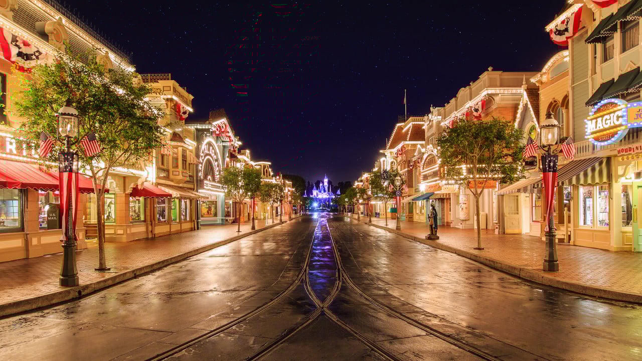Disneyland's Main Street USA at night.