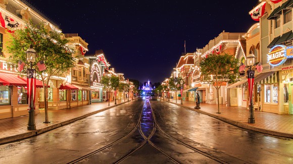 Disneyland's Main Street USA at night.