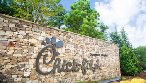 The Chick-fil-A logo on a stone wall