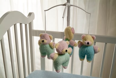 Baby crib with stuffed bears