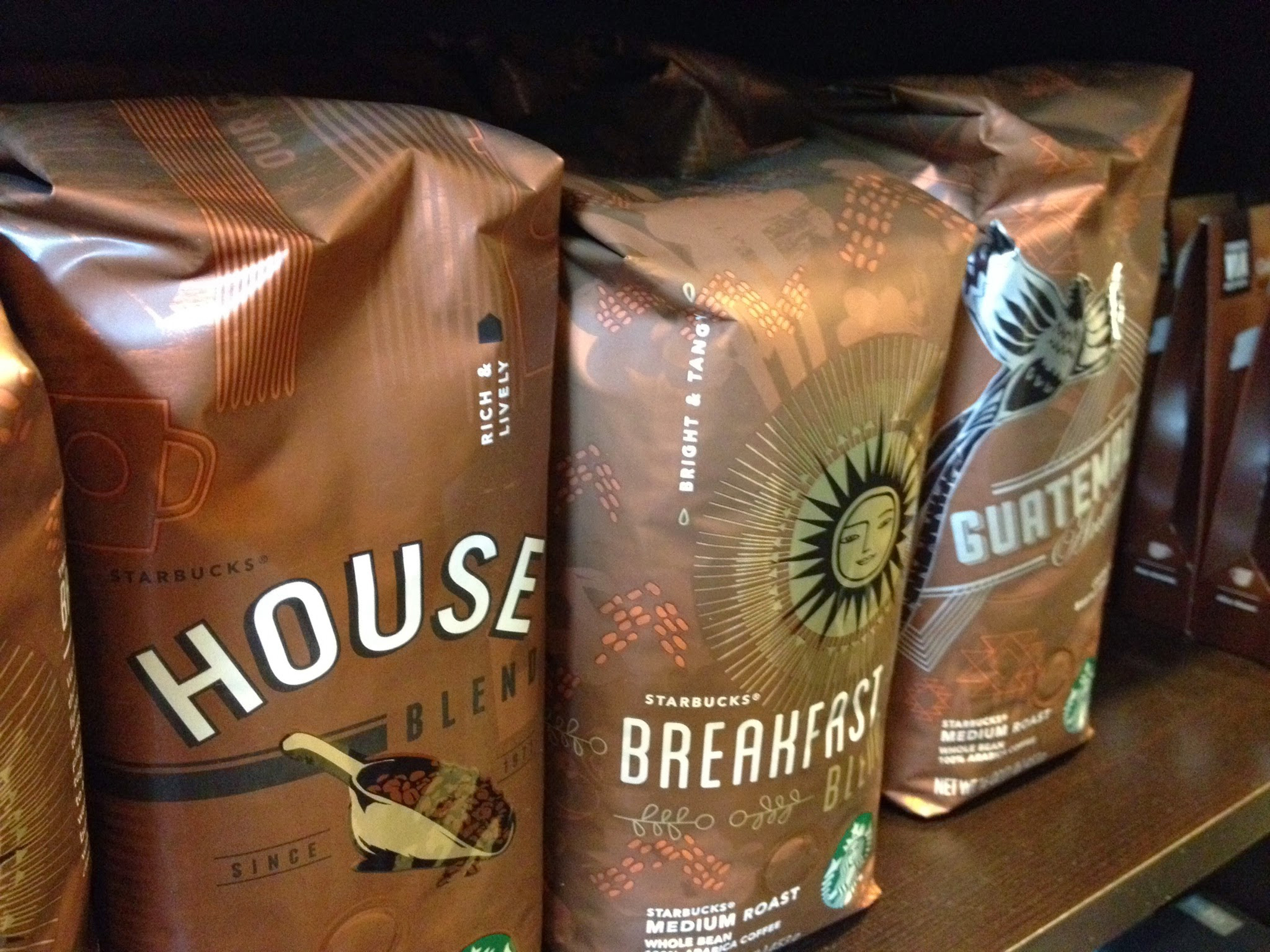 A row of Starbucks coffee bags